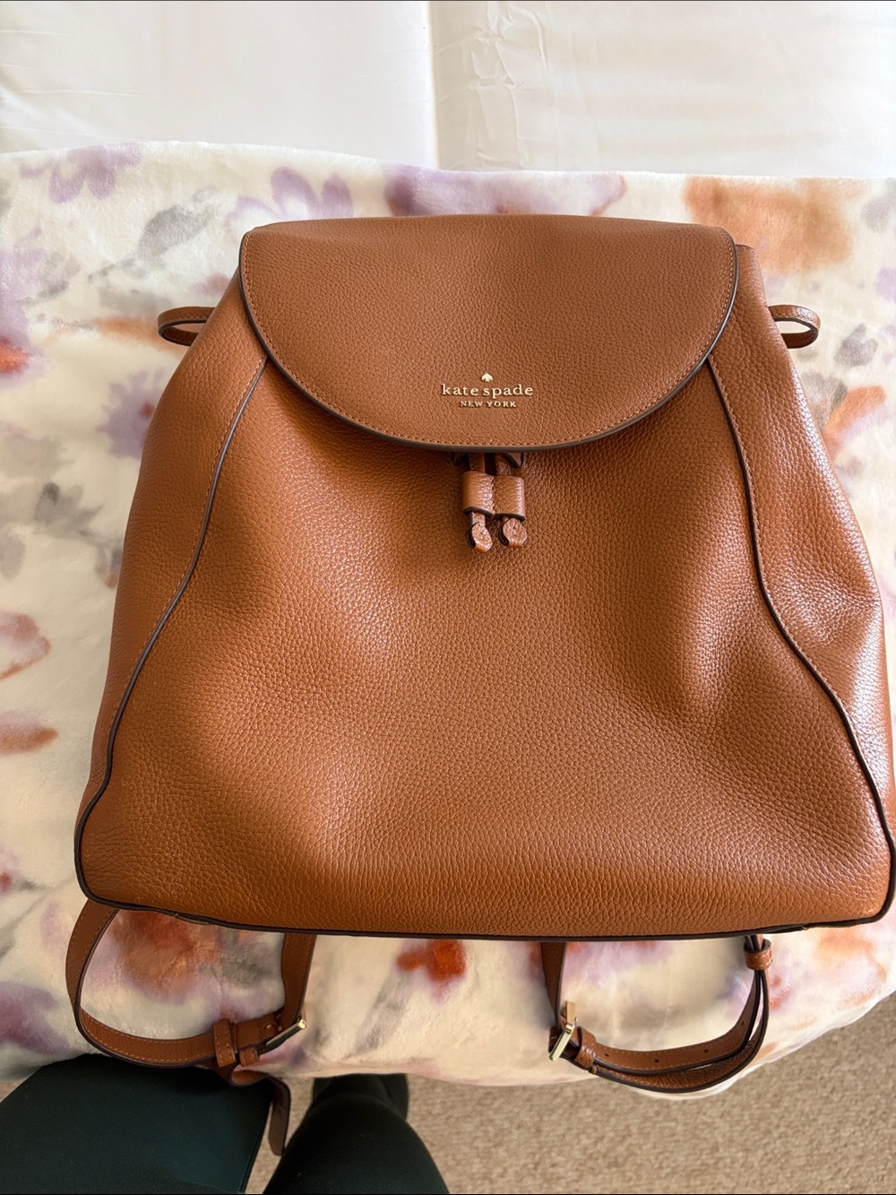 kate spade tan pebbled leather backpack with tassel